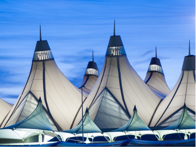 Peaked rooftop of Denver International Airport, the site of one of Xcel&rsquo;s seven proposed microgrids. Photo by Arina P Habich/Shutterstock.com