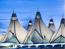 Peaked rooftop of Denver International Airport, the site of one of Xcel&rsquo;s seven proposed microgrids. Photo by Arina P Habich/Shutterstock.com