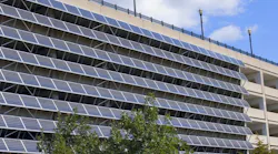 Solar panels mounted on exterior wall of parking garage in Saint Paul, Minn. Photo by Joe Ferrer/Shutterstock.com