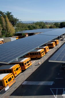 Solar parking canopies shading school buses at Analy High School, a Sage Energy site in the West Sonoma County Union High School District. Courtesy of Sage Energy