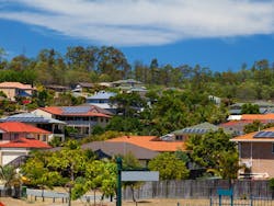 Solar panel on home in Australian suburban neighborhood. Credit zstock/Shutterstock.com