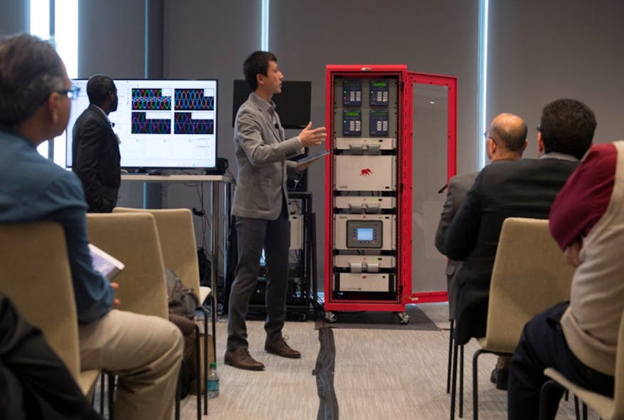 Qiang Fu from EATON presenting Eaton&rsquo;s microgrid controller in the loop with the HIL microgrid testbed at the MIT Lincoln Laboratory Microgrid Symposium 2017. (Photo: Typhoon HIL)