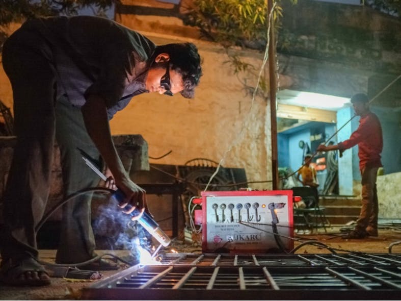 Workers in Kamalapuram, India. Photo by Paul Prescott/Shutterstock.com