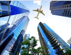 Plane flying over Atlanta, Georgia. Photo by By cate_89/Shutterstock.com Plane flying over Atlanta, Georgia. Photo by By cate_89/Shutterstock.com