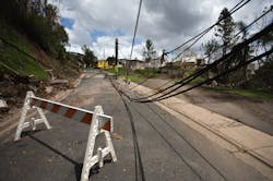 Electrical lines in Puerto Rico after Hurricane Maria. By RaiPhoto/Shutterstock.com