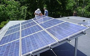 Solar array on a roof near Poughkeepsie, NY. Credit: Wikimedia Commons