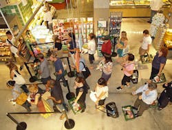 Waiting_in_line_at_a_food_store Waiting_in_line_at_a_food_store