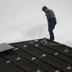 solar-man-on-roof-150x150