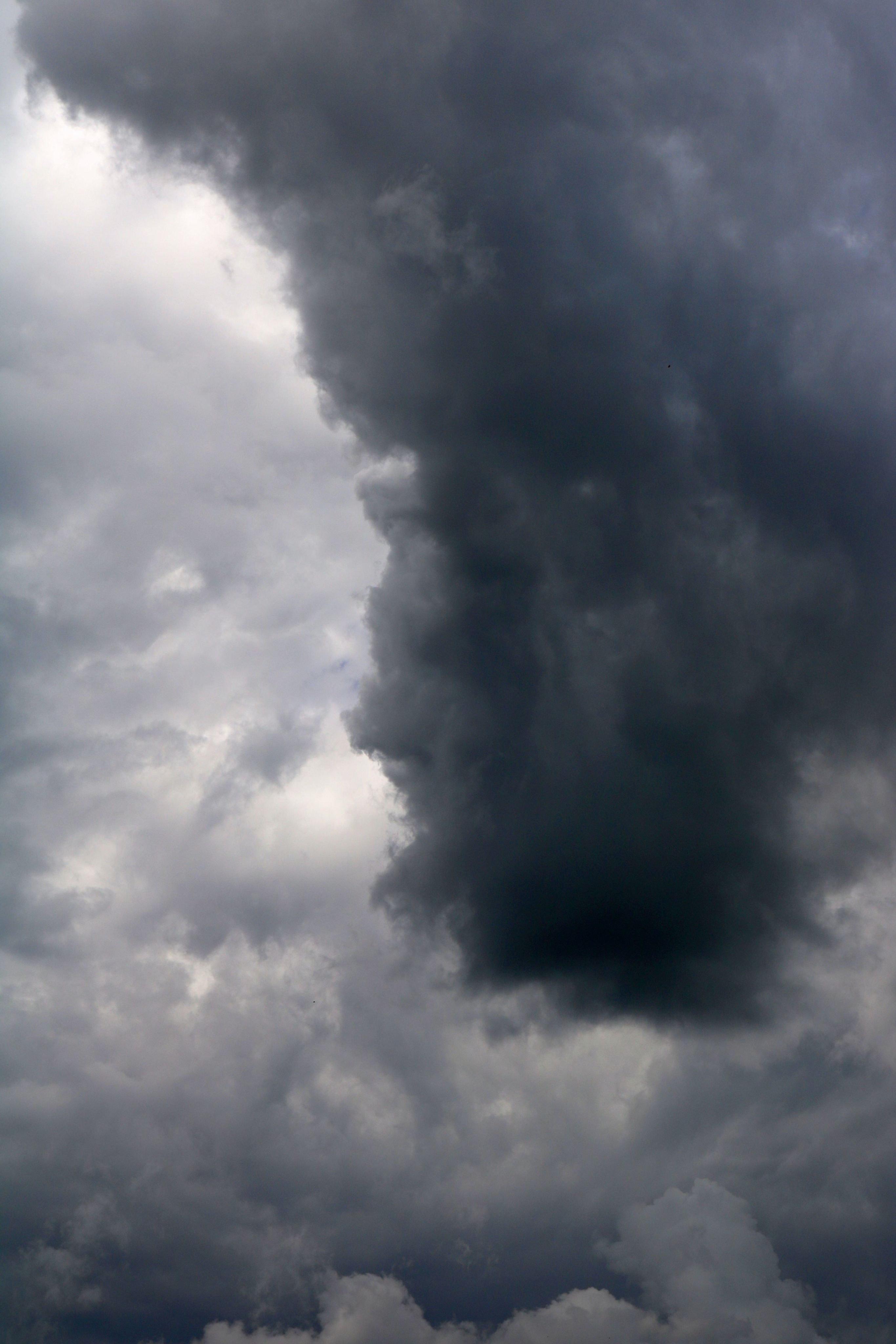 Storm clouds forming over Green Lake, Wisconsin. By ptpstudio4