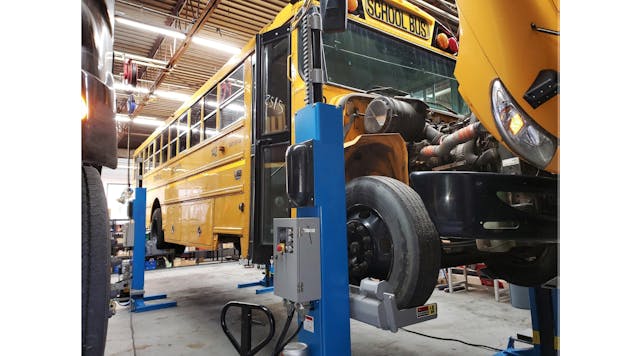 Repowering a school bus with a Vehicle-to-Grid (V2G) bi-directional electric vehicle charging system. Courtesy of AMPLY