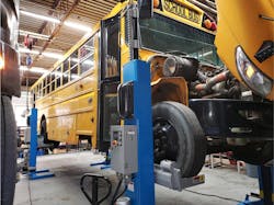Repowering a school bus with a Vehicle-to-Grid (V2G) bi-directional electric vehicle charging system. Courtesy of AMPLY Repowering a school bus with a Vehicle-to-Grid (V2G) bi-directional electric vehicle charging system. Courtesy of AMPLY