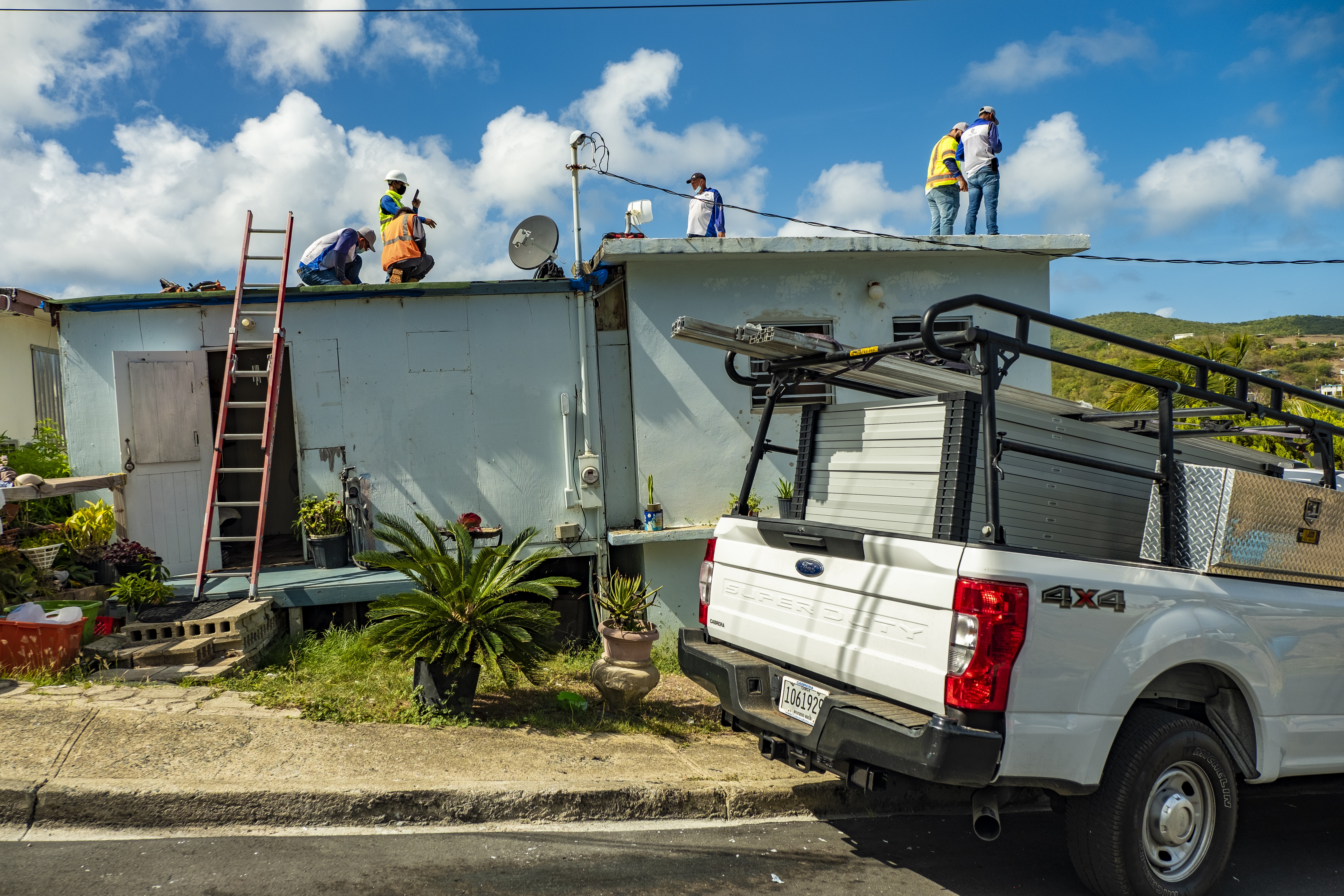 Installing solar on houses in Culibra, photo credit Angel Luis Garcia