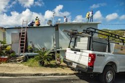 Installing solar on houses in Culibra, photo credit Angel Luis Garcia Installing solar on houses in Culibra, photo credit Angel Luis Garcia