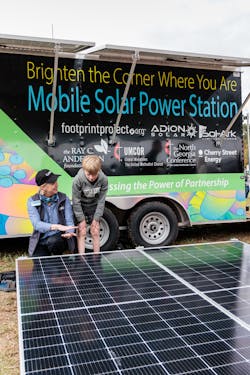 A new solar microgrid trailer was unveiled at RayDay, an annual sustainability event held near Atlanta, GA. Photo by www.BenRosePhotography.com A new solar microgrid trailer was unveiled at RayDay, an annual sustainability event held near Atlanta, GA. Photo by www.BenRosePhotography.com
