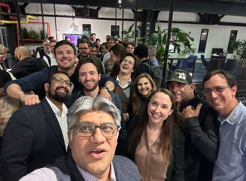 DOE's Loan Programs Office director Jigar Shah, foreground, and friends. at a recent event.