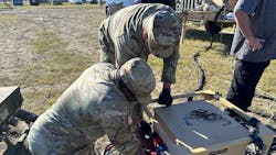 Soldiers from the 14th FH working on the Microgrid System setup and connections during an operational test conducted by the U.S. Army Test and Evaluation Activity at Fort Stewart, Georgia on Nov. 5, 2023. (Photo Credit: Jose Rodriguez, U.S. Army Medical Center of Excellence)
