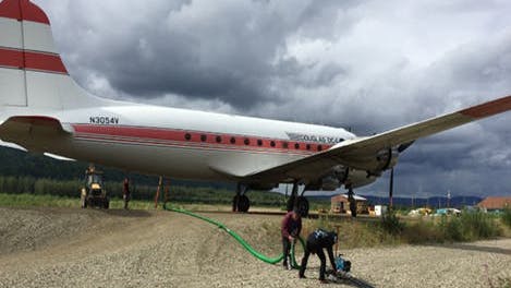 Douglas DC-6 aircraft, one of the planes which bring diesel fuel to some of the most remote communities. Photo credit Mayfield Renewables