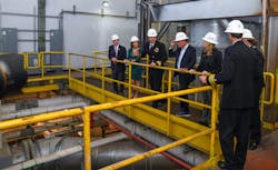 Cmdr. Austin Rasbach, public works officer at Naval Submarine Base New London, leads a tour of Navy and state officials through the base's power plant. (Photo Credit: MC2 Maxwell Higgins, U.S. Navy) Cmdr. Austin Rasbach, public works officer at Naval Submarine Base New London, leads a tour of Navy and state officials through the base's power plant. (Photo Credit: MC2 Maxwell Higgins, U.S. Navy)
