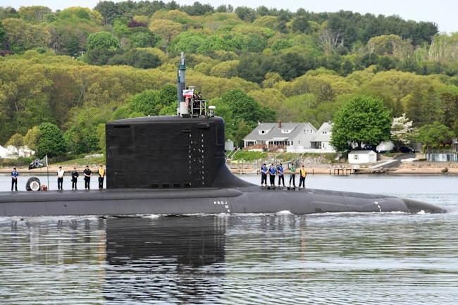 The Virginia-class attack submarine USS California (SSN 781) transits the Thames River during a change-of-command ceremony near Naval Submarine Base New London in Groton, Connecticut. (Source: U.S. Navy photo by Chief Petty Officer Joshua Karsten)