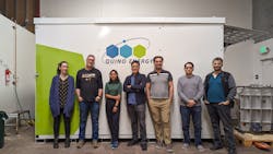 quino_100_kwh_demo_battery_system_with_the_team quino_100_kwh_demo_battery_system_with_the_team