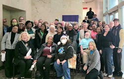 Supporters behind the Neighborhood Power Plan celebrate its passage by the New Orleans City Council earlier this month. Image credit Together Louisiana Supporters behind the Neighborhood Power Plan celebrate its passage by the New Orleans City Council earlier this month. Image credit Together Louisiana