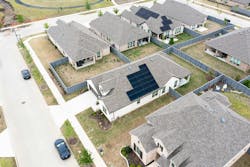 Aerial image showing residential solar and Tesla charger. Image credit CoServ Aerial image showing residential solar and Tesla charger. Image credit CoServ