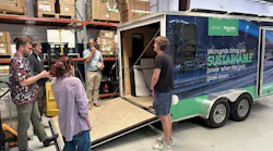 Some of the Footprint Project team gathers around in preparing to roll out a mobile microgrid. Some of the Footprint Project team gathers around in preparing to roll out a mobile microgrid.