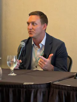 Greg Castle of Schneider Electric speaks during a session at the Great Transformation event. Image credit Lisa Cohn