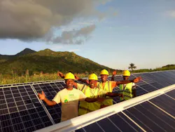 Solar work for minigrid projects in Cameroon. Image credit IEEE Smart Village