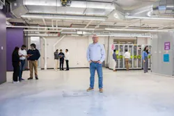 Mahmoud Kabalan, Bright Green Director of the Center for Microgrid Research, stands amidst his facility's upgraded infrastructure on the St. Thomas University campus. Image credit Brandon Woller/STU